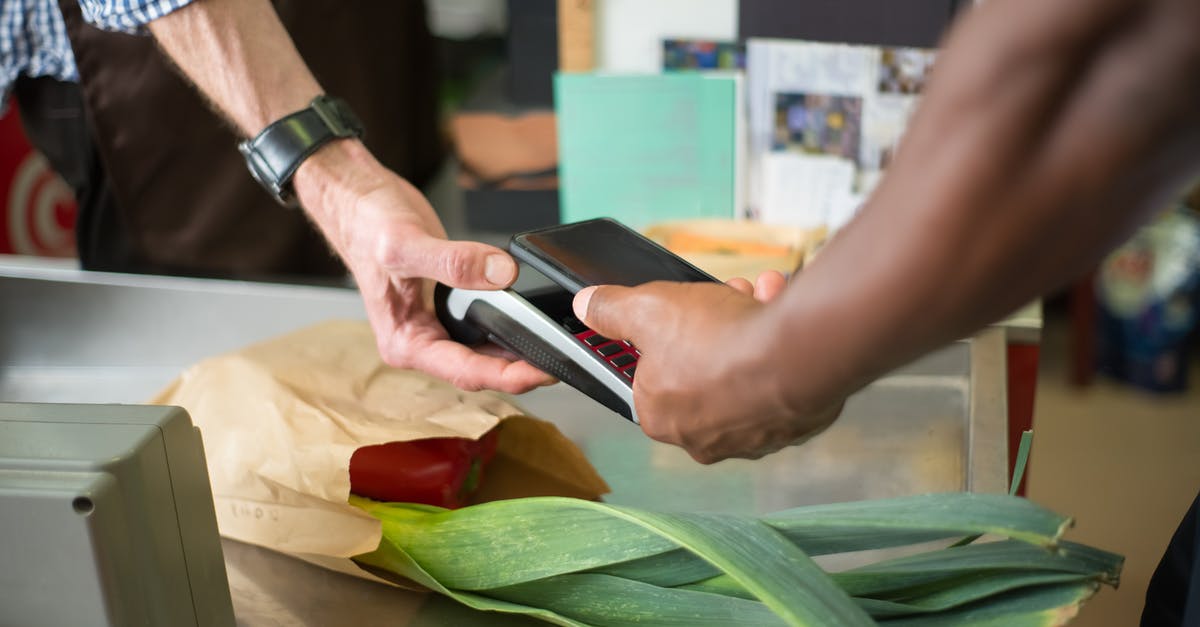 How to store onions [duplicate] - A Customer Paying for Groceries Using a Smartphone