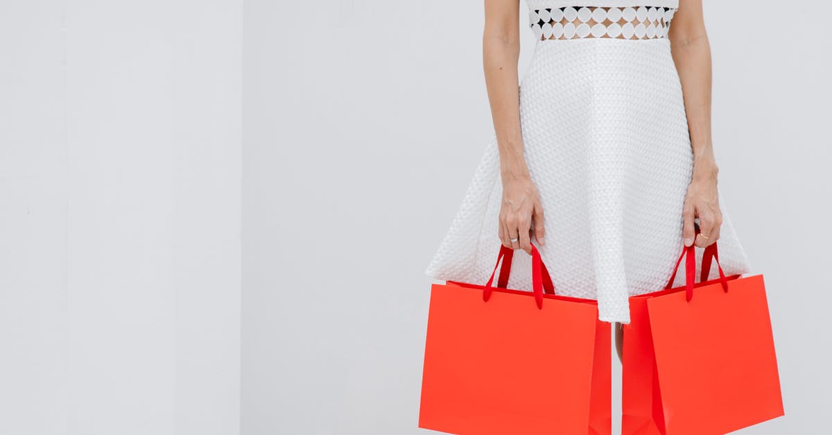 How to store red bean paste? - Crop unrecognizable woman carrying red shopping bags in studio How to store red bean paste? - Crop unrecognizable woman carrying red shopping bags in studio