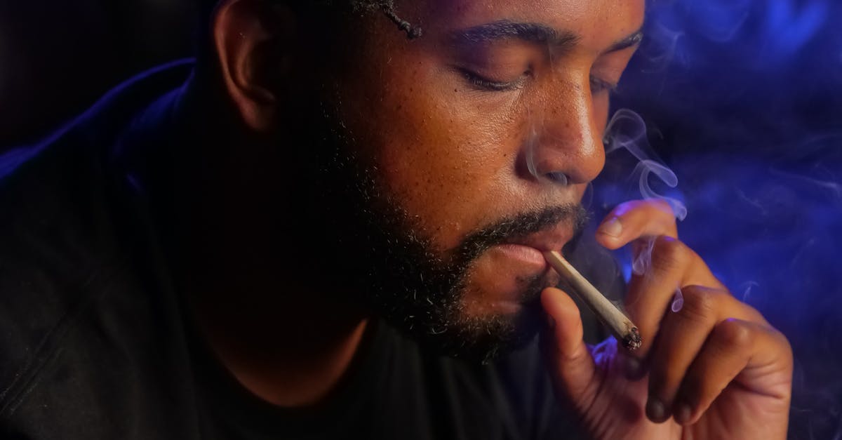 How to stuff bread puffs (Gougeres) - Close-Up Photo of Man Smoking Cigarette in Dark Room How to stuff bread puffs (Gougeres) - Close-Up Photo of Man Smoking Cigarette in Dark Room