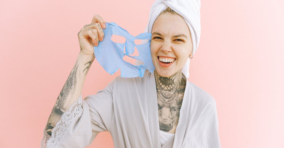 How to take care of glazed earthenware? - Happy woman removing face mask after taking bath How to take care of glazed earthenware? - Happy woman removing face mask after taking bath