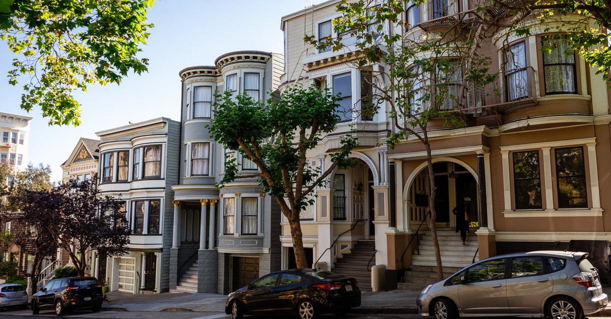 How to taste a real ranch dressing outisde of the US - Cars parked near mansions in city residential district in sunlight How to taste a real ranch dressing outisde of the US - Cars parked near mansions in city residential district in sunlight