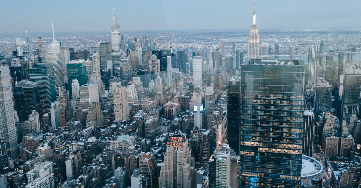 How to taste a real ranch dressing outisde of the US - Drone view of modern high rise buildings and residential houses located on street of New York City against cloudless sky How to taste a real ranch dressing outisde of the US - Drone view of modern high rise buildings and residential houses located on street of New York City against cloudless sky