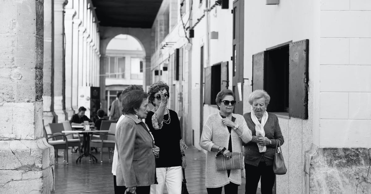 How to transport several pies? - Four Women Standing on Hallway