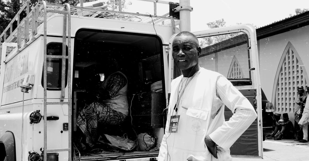 How to transport several pies? - Grayscale Picture of a Man and a Van