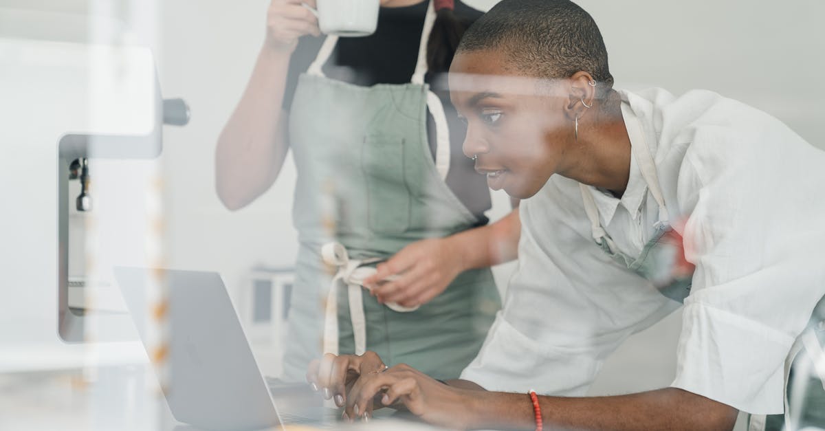 How to understand flavors and when to use combination of them? - Black female barista together with colleague using laptop at work How to understand flavors and when to use combination of them? - Black female barista together with colleague using laptop at work