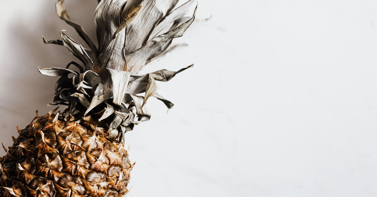 how to unstick dried pineapple chunks that are stuck together - Top view of ripe whole pineapple with dried crown placed on white background how to unstick dried pineapple chunks that are stuck together - Top view of ripe whole pineapple with dried crown placed on white background