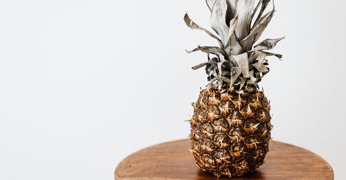 how to unstick dried pineapple chunks that are stuck together - Decorative whole pineapple placed on wooden surface how to unstick dried pineapple chunks that are stuck together - Decorative whole pineapple placed on wooden surface