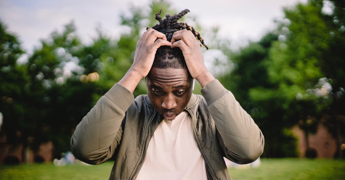 How to use a pressure cooker for frozen chicken? - Upset young African American male freelancer clutching head with hands after failure in project while working remotely in park How to use a pressure cooker for frozen chicken? - Upset young African American male freelancer clutching head with hands after failure in project while working remotely in park