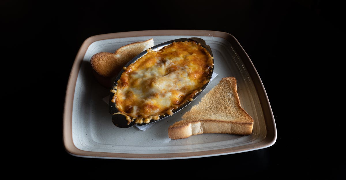 I'm tweaking a Lasagna Bolognese - Toasted Bread on White Ceramic Plate I'm tweaking a Lasagna Bolognese - Toasted Bread on White Ceramic Plate
