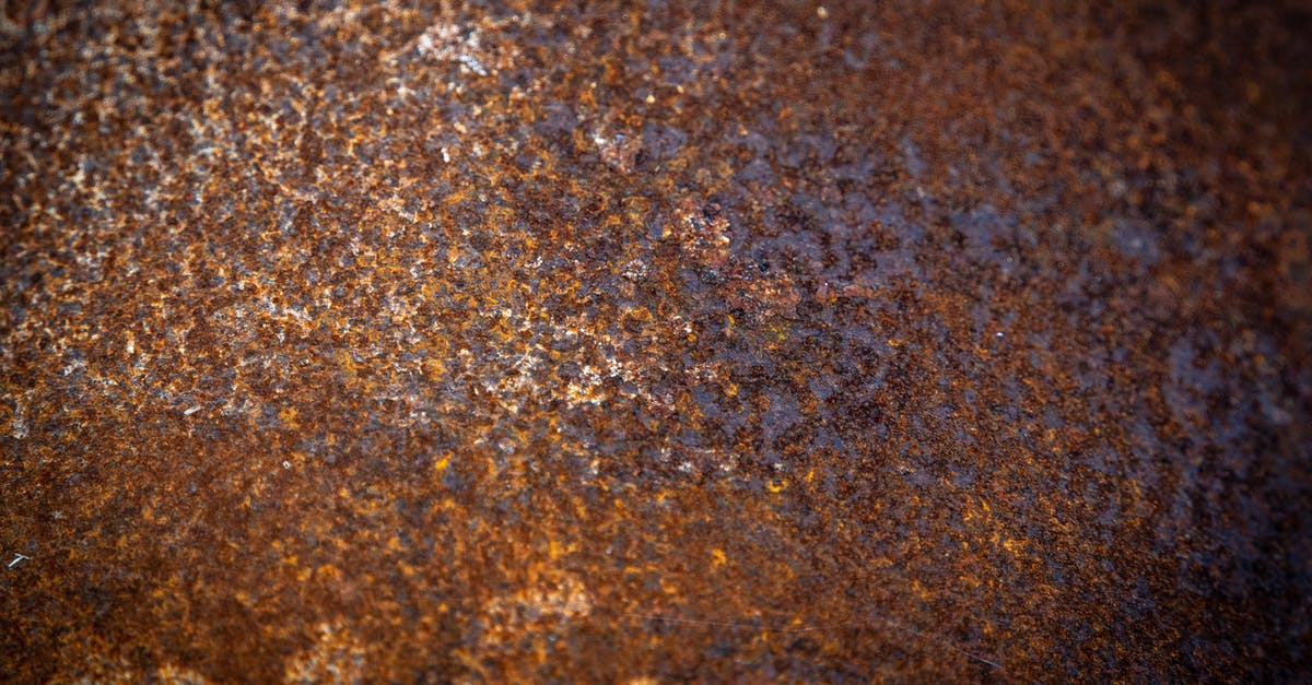 I bought a cast iron skillet and after washing it and then heating it I got a color like rust - Brown and Black Marble Surface I bought a cast iron skillet and after washing it and then heating it I got a color like rust - Brown and Black Marble Surface