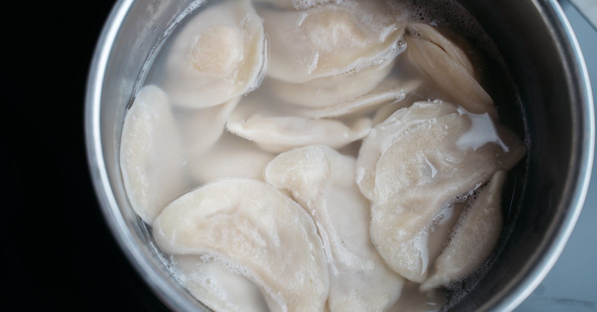 I ruined my dumplings in the crock pot - Dumplings Cooking in the Stainless Cooking Pot with Water I ruined my dumplings in the crock pot - Dumplings Cooking in the Stainless Cooking Pot with Water