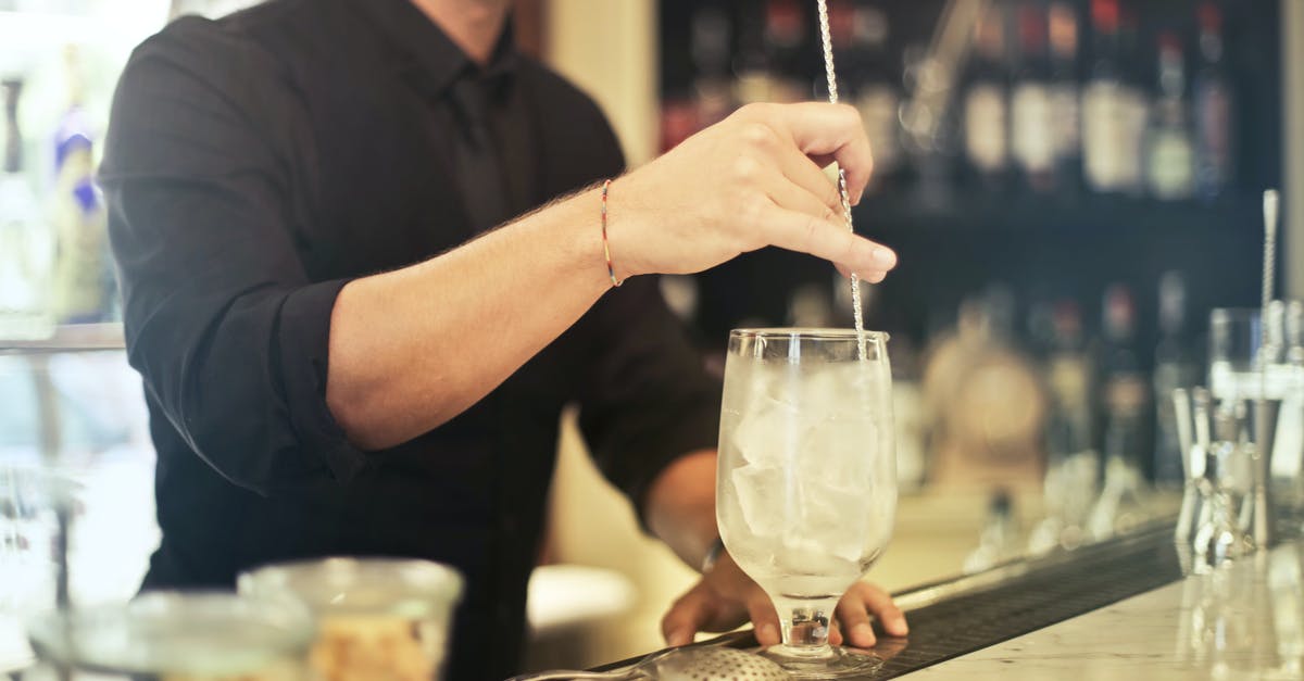 Ice cream technique - what should I mix into what? - Crop barman making cocktail in pub Ice cream technique - what should I mix into what? - Crop barman making cocktail in pub