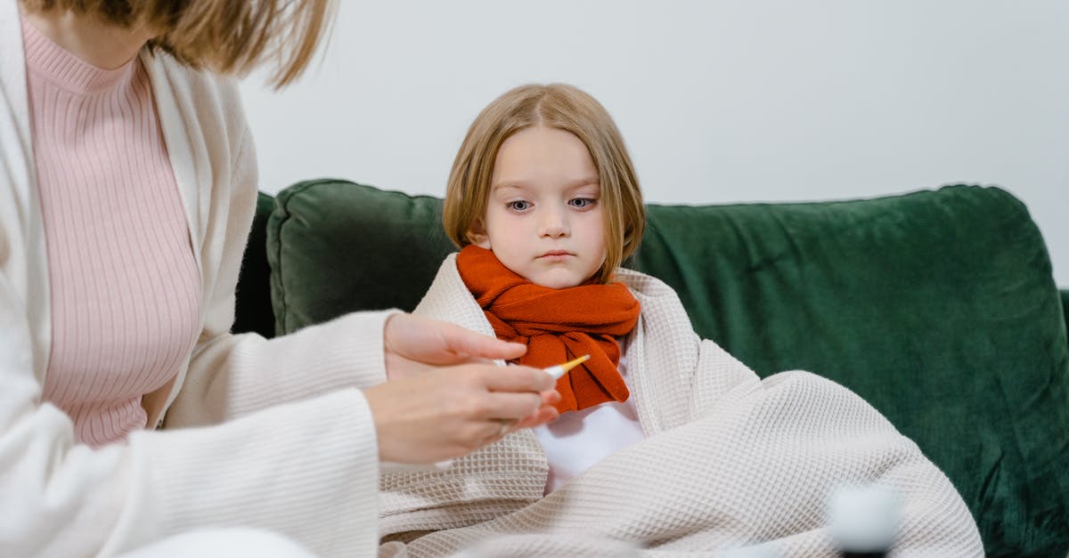 Ideal fridge temperature accounting for temperature spikes - Woman in White Sweater Holding Baby in Orange and White Sweater Ideal fridge temperature accounting for temperature spikes - Woman in White Sweater Holding Baby in Orange and White Sweater