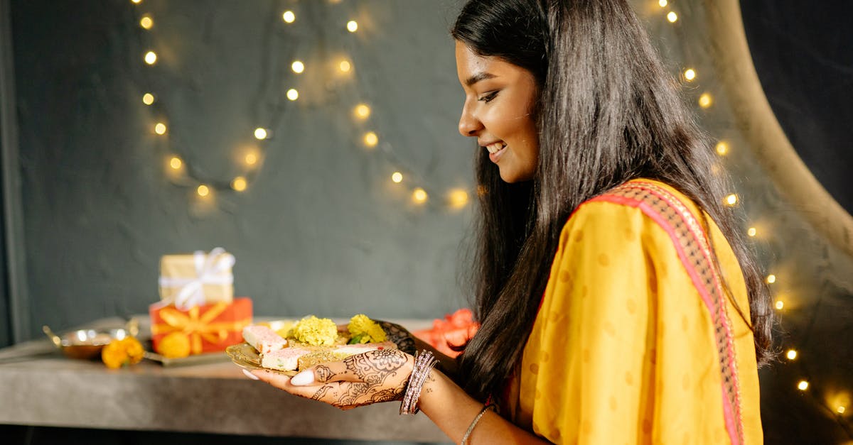 Identify this dessert - Woman in Yellow Dress Eating Identify this dessert - Woman in Yellow Dress Eating