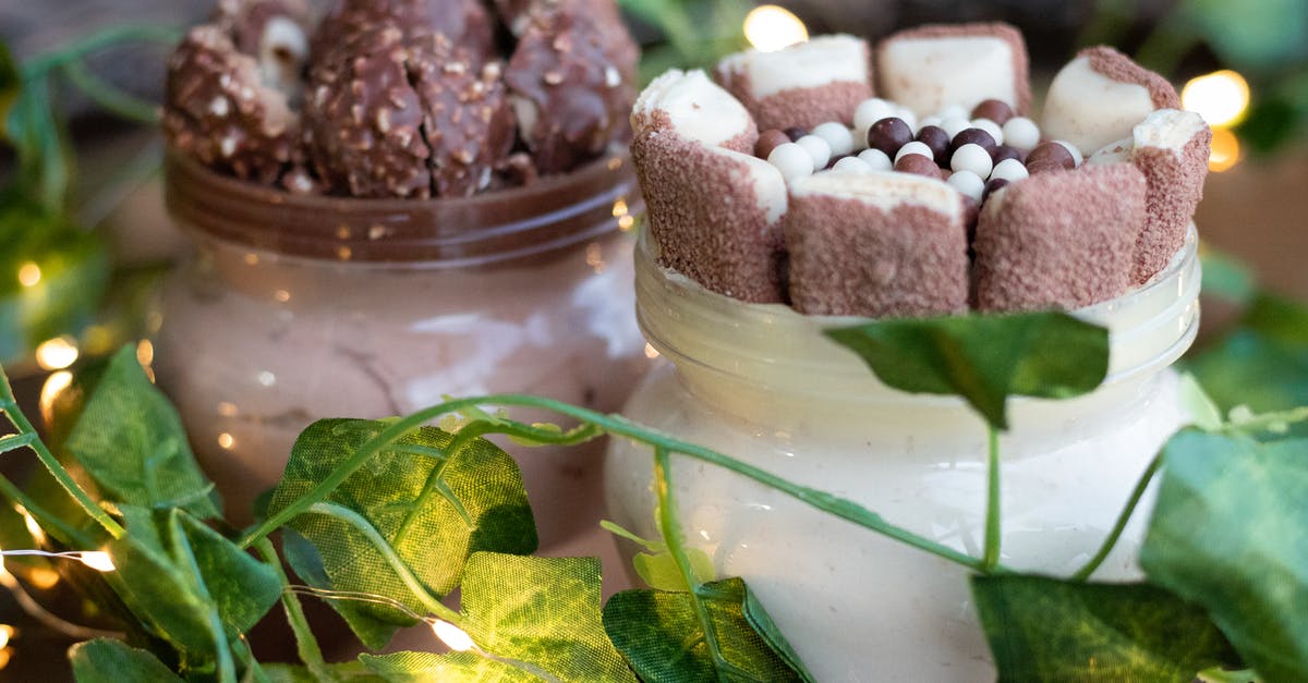 Increase lifetime of homemade chocolates - Chocolate Sweets On Glass Jars Increase lifetime of homemade chocolates - Chocolate Sweets On Glass Jars