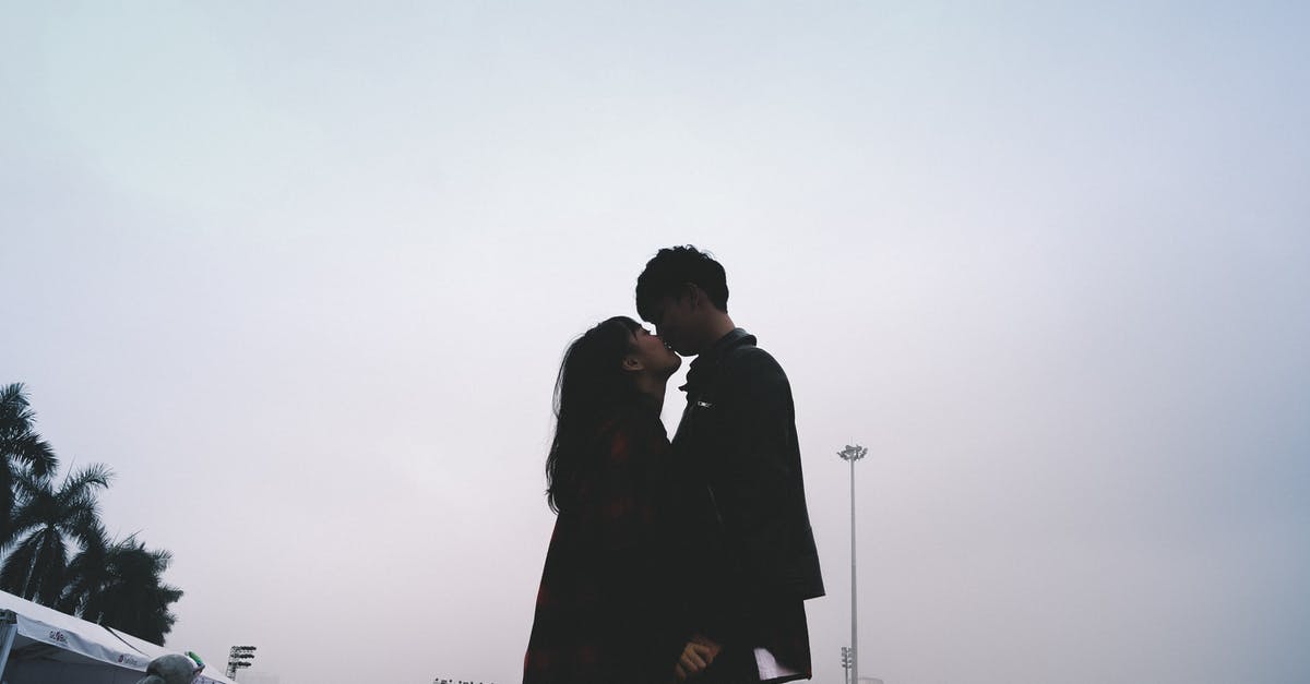 Injeolmi - Korean Sweet Rice Cakes - Couple Kissing Together Standing Near People Injeolmi - Korean Sweet Rice Cakes - Couple Kissing Together Standing Near People