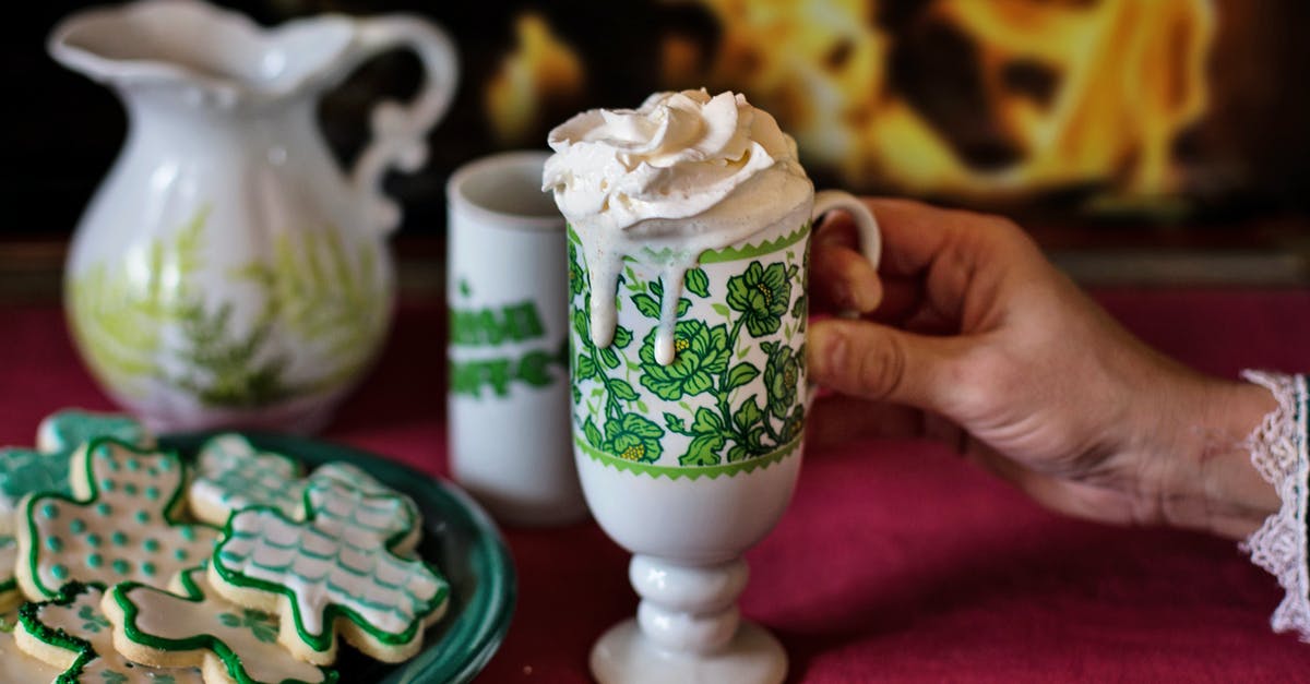 Irish Cream Manufacturing - White and Green Ceramic Floral Mug Irish Cream Manufacturing - White and Green Ceramic Floral Mug