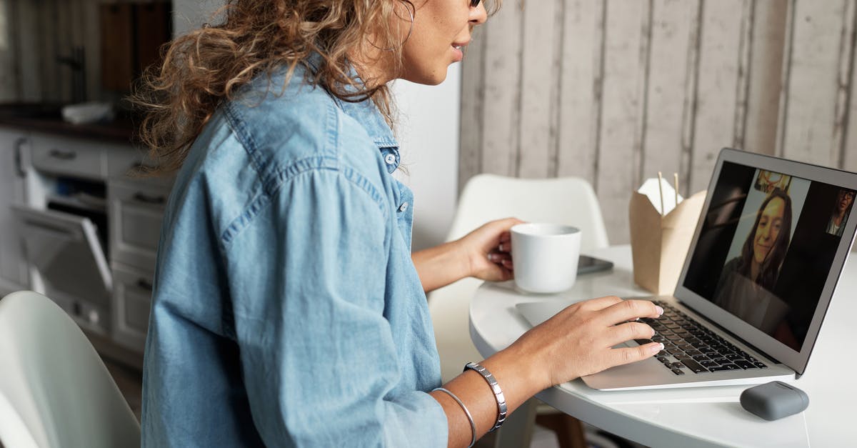 Is a portable Wok burner safe (indoors) - Woman in Blue Denim Jacket Using Macbook Pro Is a portable Wok burner safe (indoors) - Woman in Blue Denim Jacket Using Macbook Pro