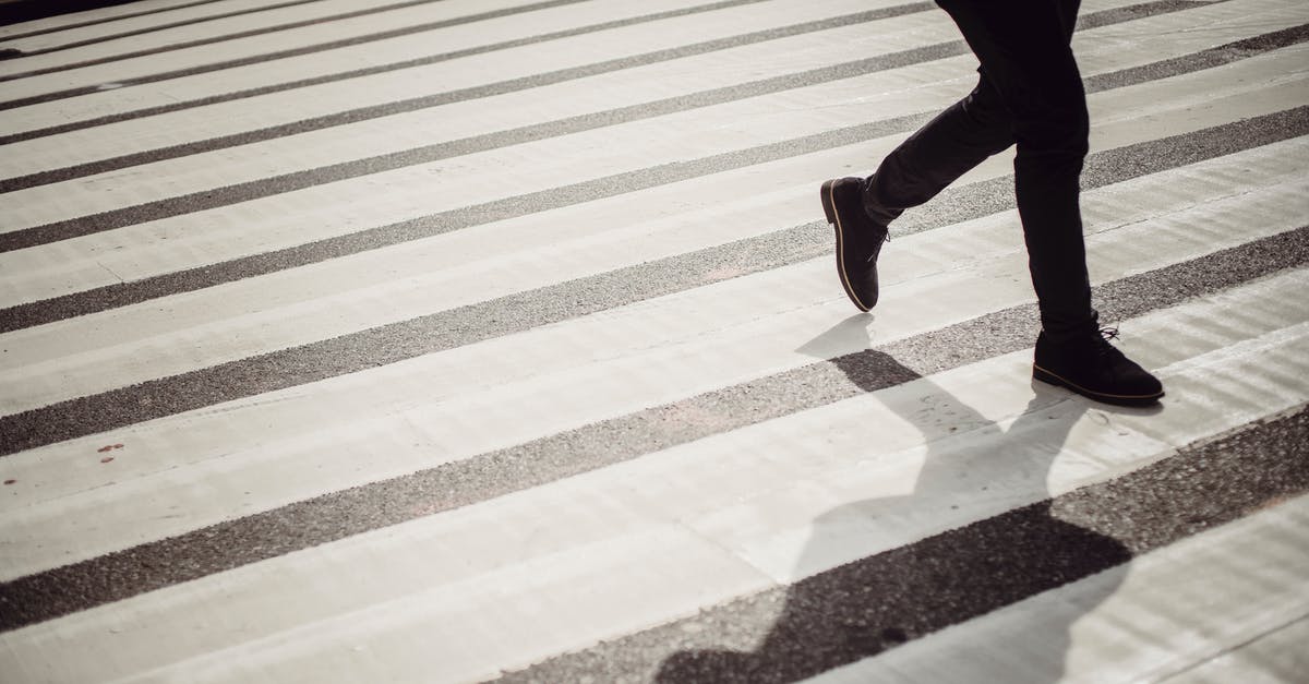 Is active dry yeast safe to eat as-is? - Crop faceless person in elegant black trousers and shoes walking on crosswalk in daytime Is active dry yeast safe to eat as-is? - Crop faceless person in elegant black trousers and shoes walking on crosswalk in daytime