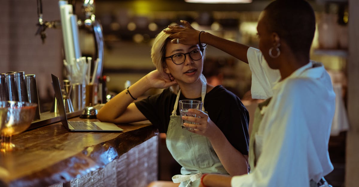 Is Bar Keeper's friend safe to use on cookware? - Content bar workers gathering with laptop at bar counter Is Bar Keeper's friend safe to use on cookware? - Content bar workers gathering with laptop at bar counter