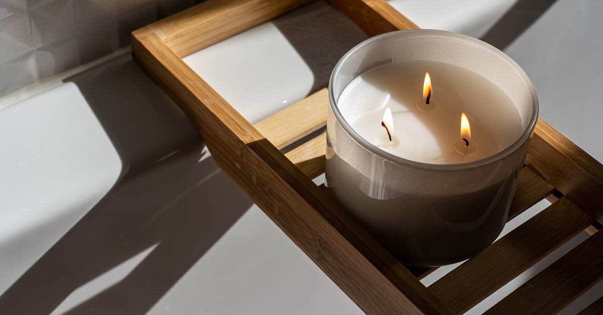 Is candle wax and cheese wax the same thing? - Photo Of Candle On Wooden Tray Is candle wax and cheese wax the same thing? - Photo Of Candle On Wooden Tray