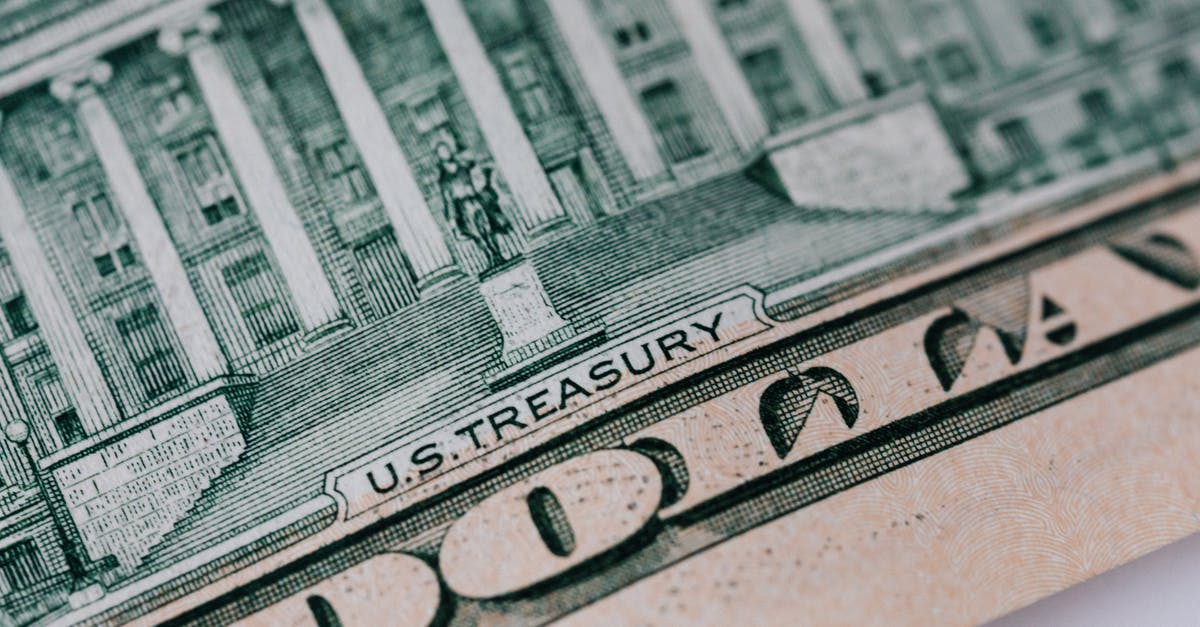 Is Casu Marzu illegal in the United States? - Dollar banknote on white table Is Casu Marzu illegal in the United States? - Dollar banknote on white table