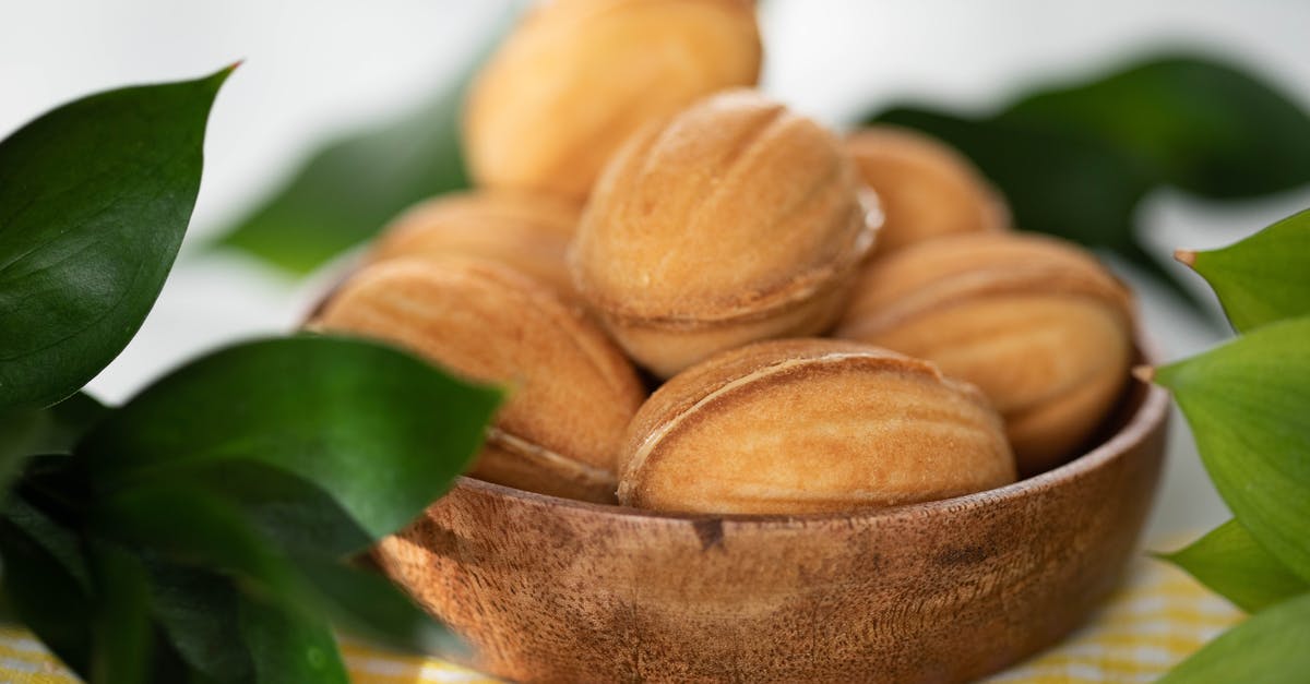 Is condensed milk the same as sweetened condensed milk? - Cookie nuts with condensed milk in bowl on table Is condensed milk the same as sweetened condensed milk? - Cookie nuts with condensed milk in bowl on table