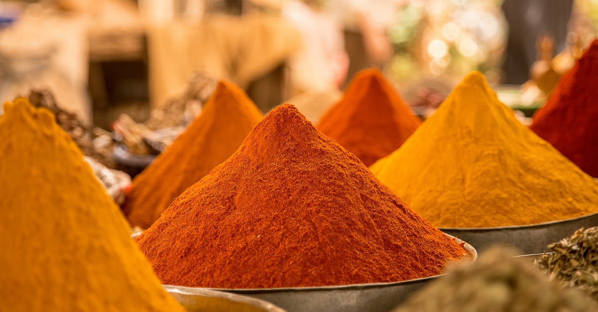 Is curry ketchup just ketchup with curry powder? - Close Up of Powdered Spices on Market Stall Is curry ketchup just ketchup with curry powder? - Close Up of Powdered Spices on Market Stall