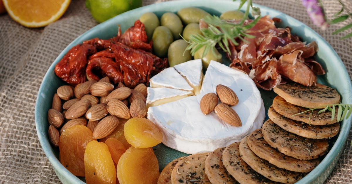 Is eating olive pits a problem? - Fried Food on White Ceramic Bowl