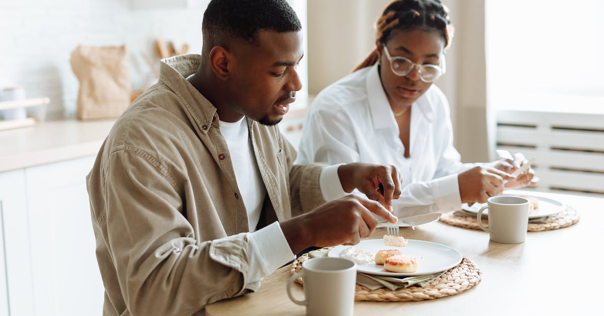 Is eating soap or bleach dangerous? - Man in White Dress Shirt Sitting Beside Man in White Dress Shirt Eating Is eating soap or bleach dangerous? - Man in White Dress Shirt Sitting Beside Man in White Dress Shirt Eating