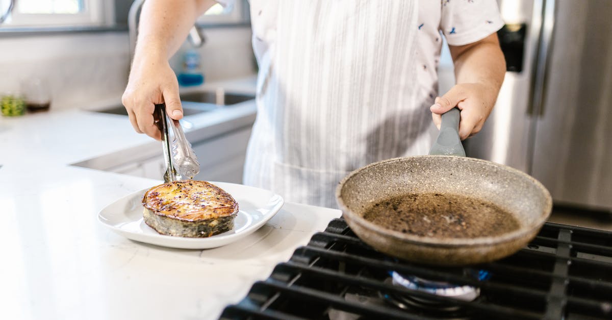 Is exposed copper pan safe for frying fish? - Cook Putting Portion of Ready Fried Salmon Slice on Plate