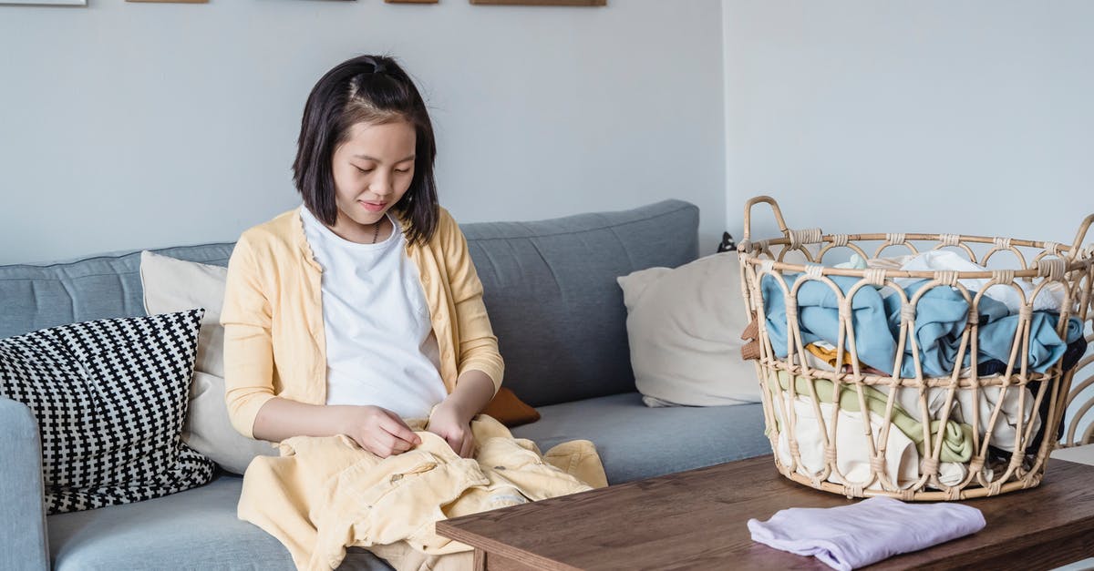 Is folding with a spatula really necessary? - Adolescent Female folding Laundries