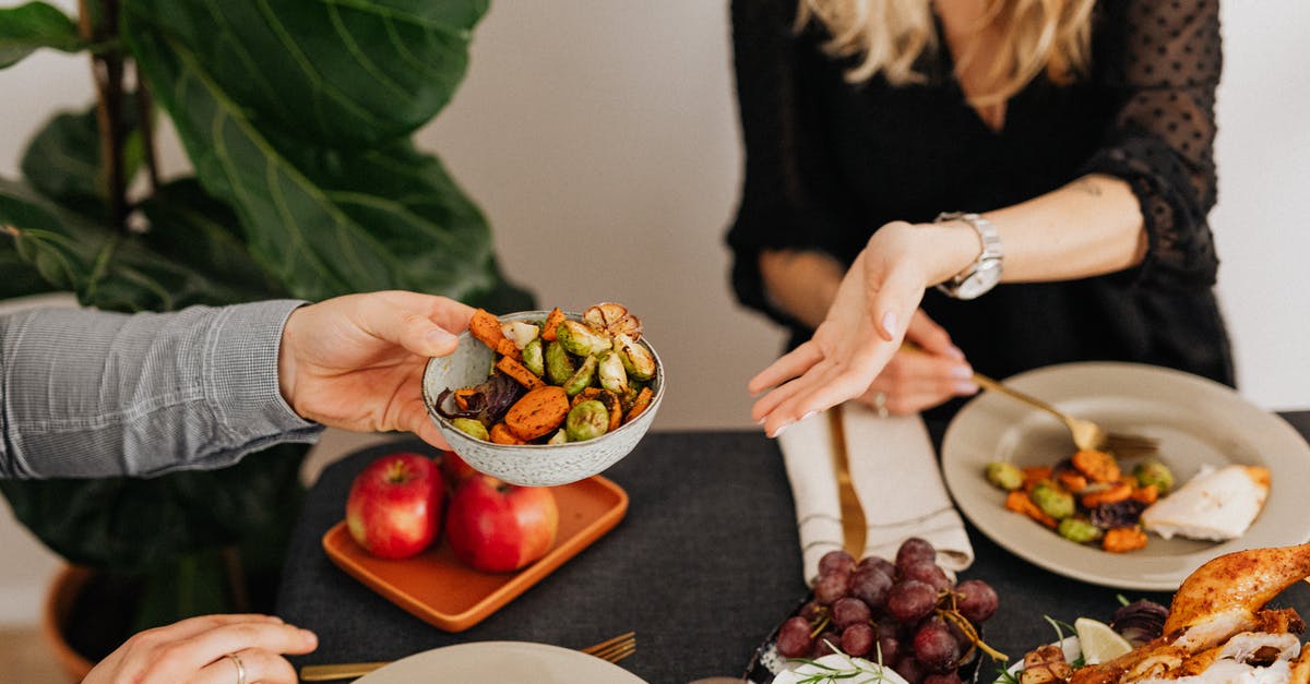 Is free-range chicken more flavourful? - Woman in Black Long Sleeve Shirt Holding Brown and Red Round Fruit Is free-range chicken more flavourful? - Woman in Black Long Sleeve Shirt Holding Brown and Red Round Fruit