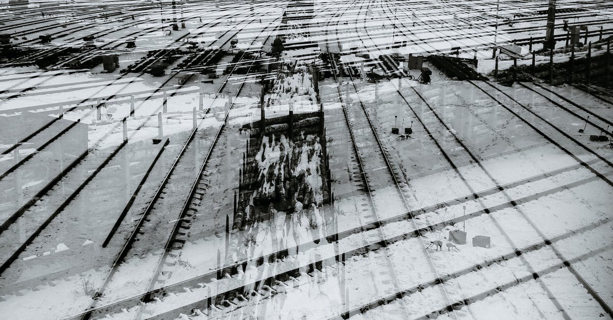Is it bad to double freeze seafood? - Railway tracks on snowy street