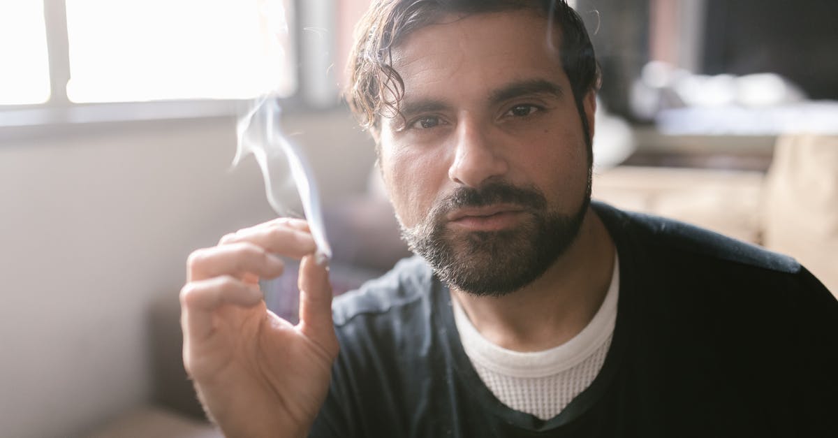 Is it obvious when an oil reaches its smoking point? - Man in Black Crew Neck Shirt Holding Cigarette Stick Is it obvious when an oil reaches its smoking point? - Man in Black Crew Neck Shirt Holding Cigarette Stick