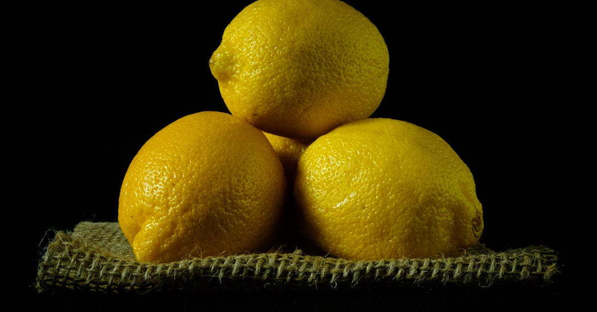 Is it okay for preserved lemons to float? - Yellow Lemon Fruit on Black Textile Is it okay for preserved lemons to float? - Yellow Lemon Fruit on Black Textile
