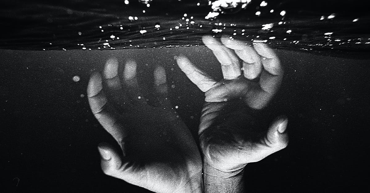 Is it possible to make transparent / translucent pastry? - Hands of crop faceless man under water Is it possible to make transparent / translucent pastry? - Hands of crop faceless man under water