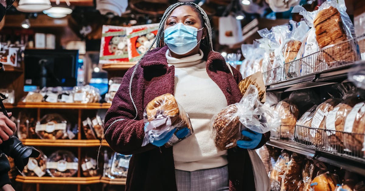 Is it safe to consume microwaved Campbell’s chicken stock? - African American female buyer in protective mask and gloves carrying loafs of bread in grocery store Is it safe to consume microwaved Campbell’s chicken stock? - African American female buyer in protective mask and gloves carrying loafs of bread in grocery store