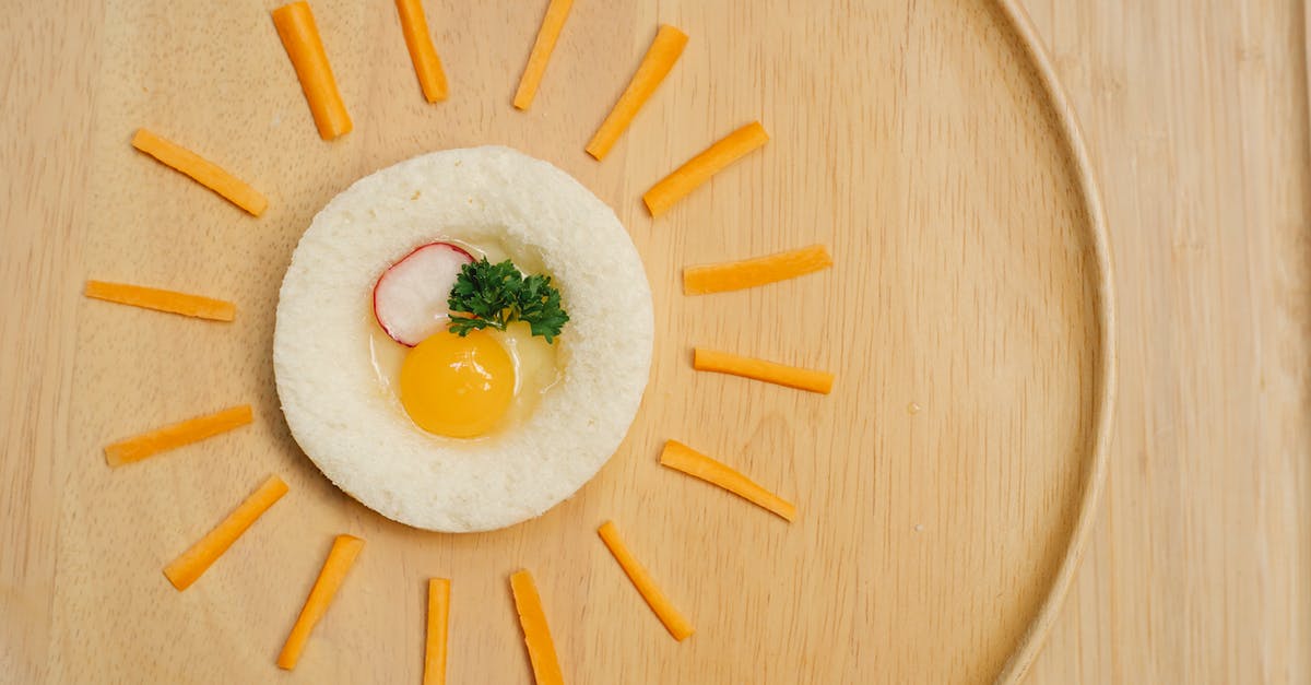 Is it safe to eat raw eggs? - Multiethnic kids in headbands with hare ears eating fresh carrots while looking at camera on Easter Day at home Is it safe to eat raw eggs? - Multiethnic kids in headbands with hare ears eating fresh carrots while looking at camera on Easter Day at home
