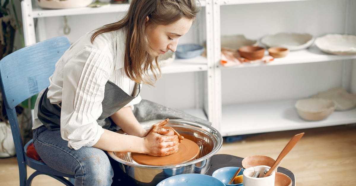 Is it safe to make chicken stock, forgot to turn crock pot on! - Woman forming clay bowl on pottery wheel Is it safe to make chicken stock, forgot to turn crock pot on! - Woman forming clay bowl on pottery wheel