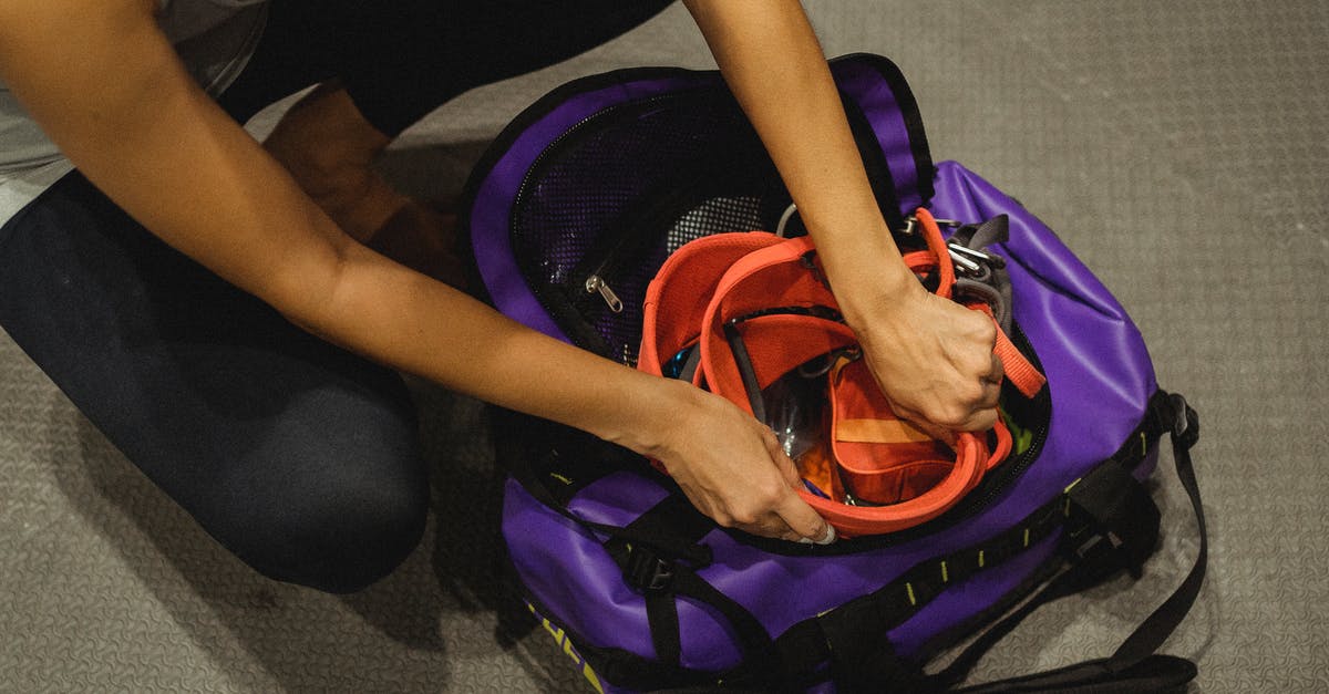 Is it safe to put silica gel packets in spices? - From above of crop anonymous female athlete sitting on floor and packing safety belt in bag after training in contemporary gym Is it safe to put silica gel packets in spices? - From above of crop anonymous female athlete sitting on floor and packing safety belt in bag after training in contemporary gym