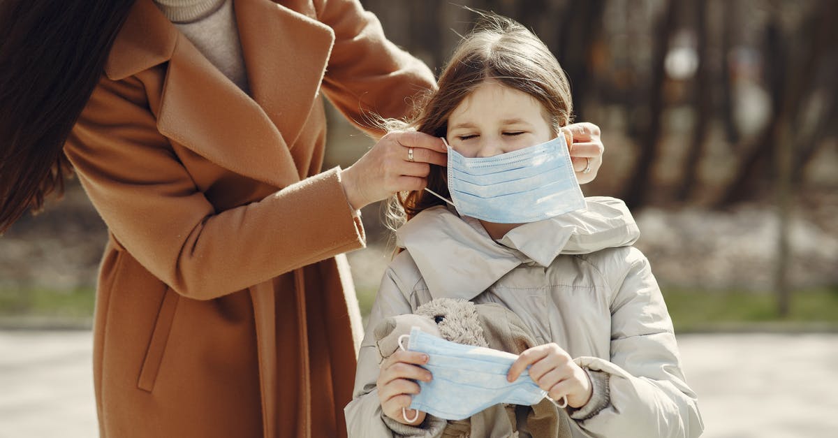 Is it safe to put silica gel packets in spices? - Crop female helping to put on medical mask for daughter during stroll in nature Is it safe to put silica gel packets in spices? - Crop female helping to put on medical mask for daughter during stroll in nature
