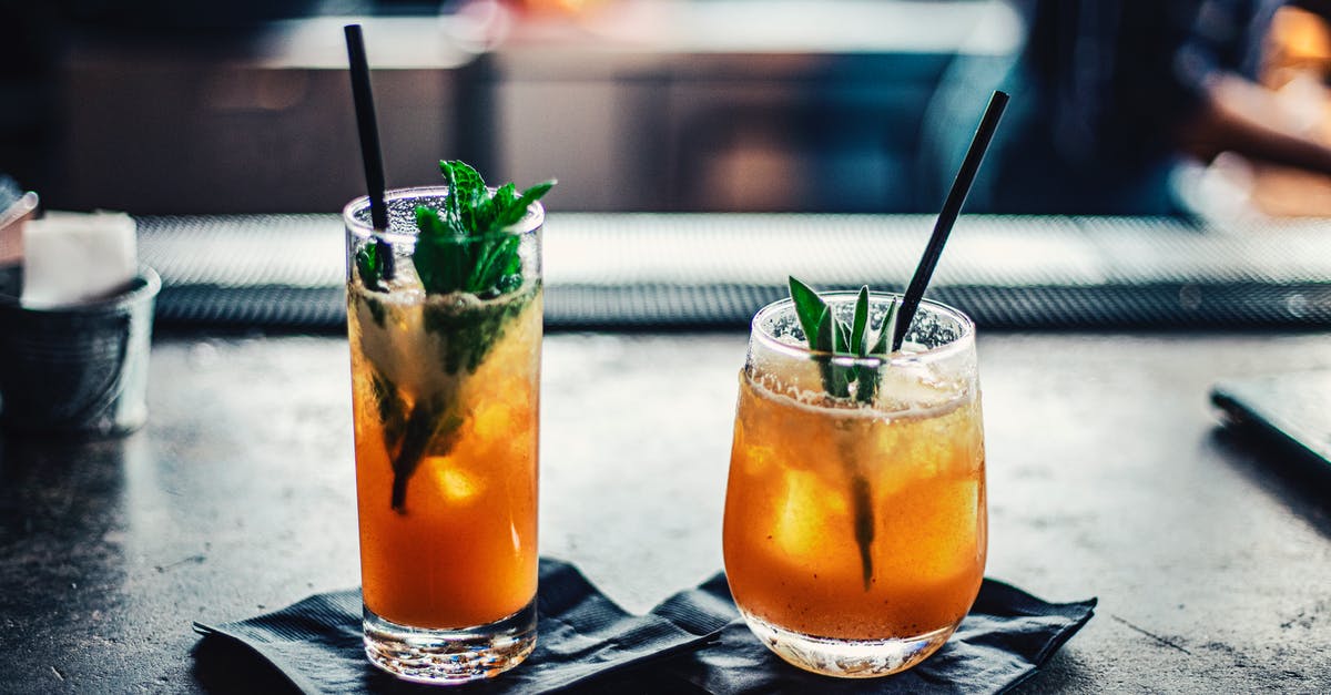 Is it safe to refreeze ice cubes? - Two Brown Liquid Inside Clear Drinking Glasses Is it safe to refreeze ice cubes? - Two Brown Liquid Inside Clear Drinking Glasses