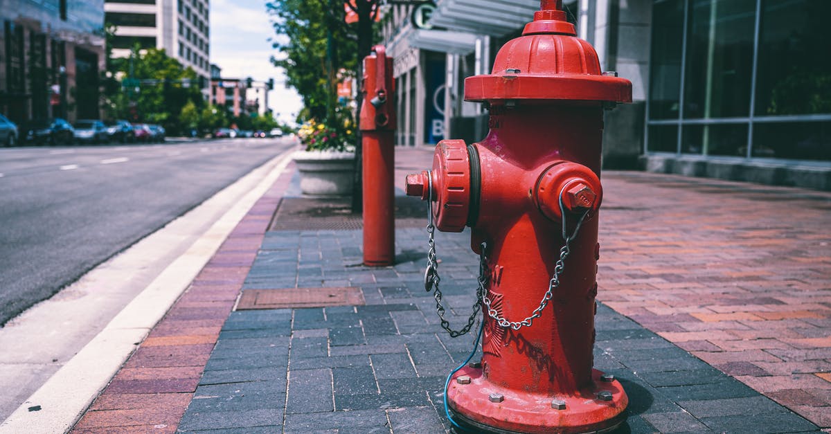 Is it safe to reheat old water in an electric kettle? - Red fire hydrant with chains located on empty street near road and building on sunny day Is it safe to reheat old water in an electric kettle? - Red fire hydrant with chains located on empty street near road and building on sunny day