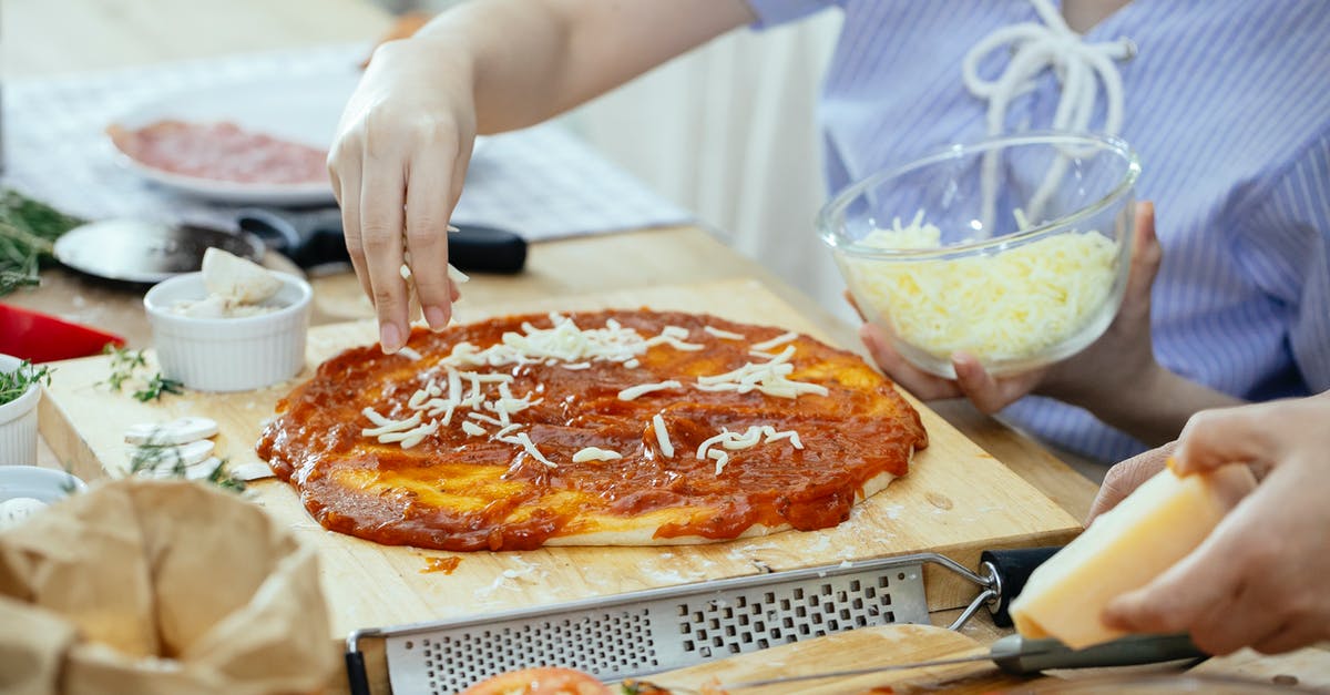 Is it sensible to add steamed vegetables to a vegetable curry to reduce cooking time? - Woman sprinkling cheese on pizza Is it sensible to add steamed vegetables to a vegetable curry to reduce cooking time? - Woman sprinkling cheese on pizza