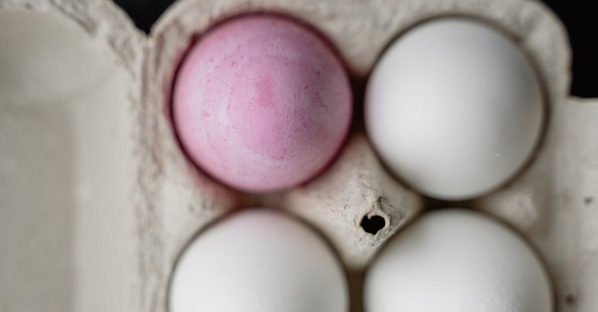 Is leaving eggs out of the fridge, prior to cooking them a direct cause as to how shell break? - White Egg on White Egg Tray Is leaving eggs out of the fridge, prior to cooking them a direct cause as to how shell break? - White Egg on White Egg Tray