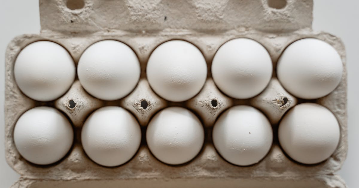 Is leaving eggs out of the fridge, prior to cooking them a direct cause as to how shell break? - White Eggs on Brown Tray Is leaving eggs out of the fridge, prior to cooking them a direct cause as to how shell break? - White Eggs on Brown Tray