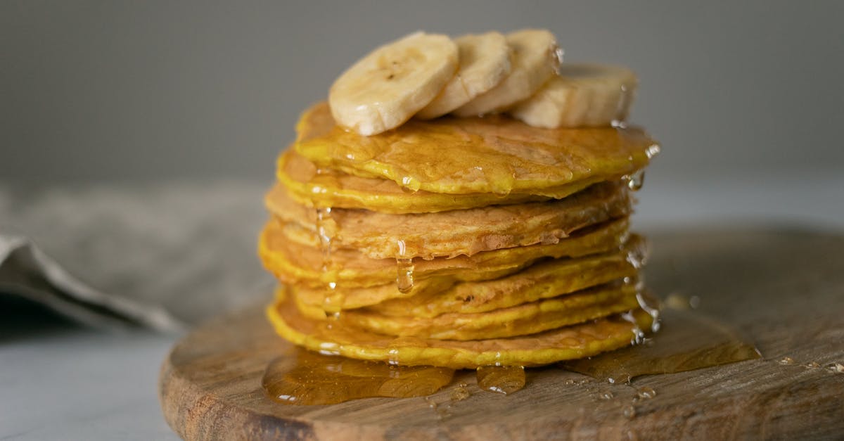 Is lemonade better when made with simple syrup? - Delicious homemade pancakes covered with honey with sliced bananas placed on wooden chopping board on table in light place Is lemonade better when made with simple syrup? - Delicious homemade pancakes covered with honey with sliced bananas placed on wooden chopping board on table in light place