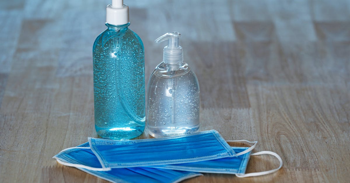 Is liquid seeping from the fish normal when making gravlax? - From above of transparent bottles with bubbled antiseptic liquid soap and gel near medical masks on table Is liquid seeping from the fish normal when making gravlax? - From above of transparent bottles with bubbled antiseptic liquid soap and gel near medical masks on table