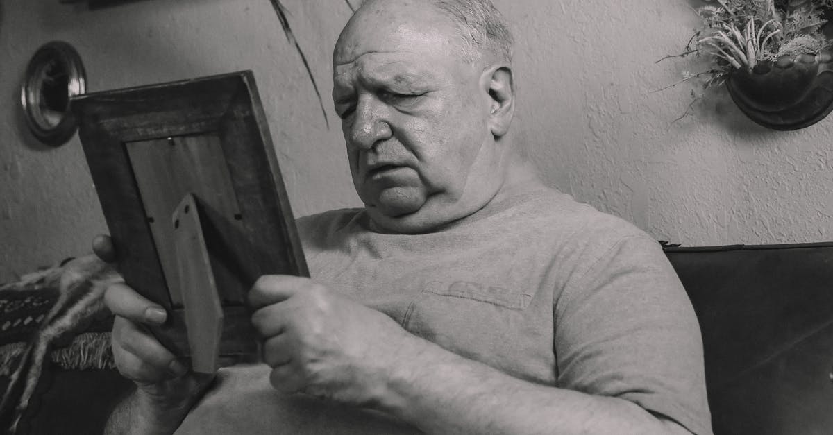 Is my ragu missing an ingredient? - A Grayscale Photo of an Elderly Man Holding a Wooden Frame Is my ragu missing an ingredient? - A Grayscale Photo of an Elderly Man Holding a Wooden Frame